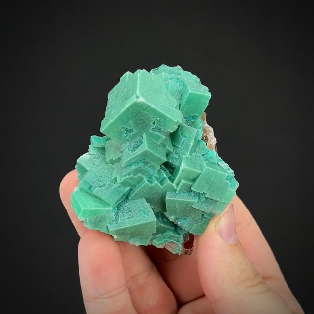 Calcite included by Dioptase