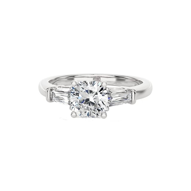 1.00 carat trilogy ring in white gold with a lab grown cushion diamond and lab grown tapered baguettes