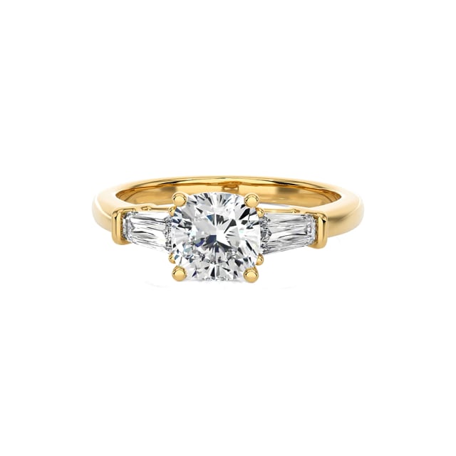 2.00 carat trilogy ring in yellow gold with a lab grown cushion diamond and lab grown tapered baguettes