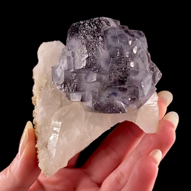 Fluorite (unusually colored crystal) on Quartz