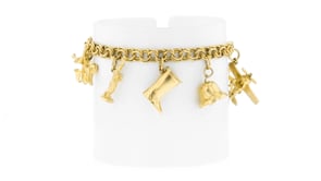 C. 1980 Vintage 14kt Yellow Gold Multi-Charm Bracelet