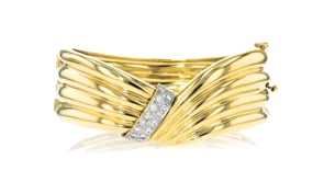 C. 1980 Vintage .80 ct. t.w. Diamond DayNight Bangle Bracelet in 14kt Yellow Gold