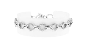 C. 1990 Vintage .50 ct. t.w. Diamond Oval-Link Bracelet in 18kt White Gold