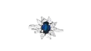 C. 1990 Vintage .75 Carat Sapphire Flower Ring with .80 ct. t.w. Diamonds in Platinum