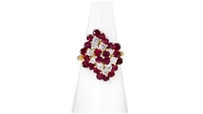 C. 1980 Vintage 2.20 ct. t.w. Ruby and .70 ct. t.w. Diamond Cluster Ring in 14kt Yellow Gold