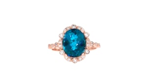 C. 2000 Vintage 5.10 Carat London Blue Topaz Ring with .35 ct. t.w. Diamonds in 14kt Rose Gold