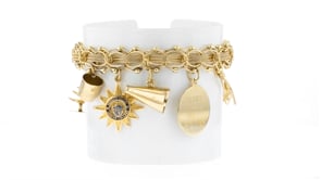 C. 1990 Vintage 14kt Yellow Gold Charm Bracelet
