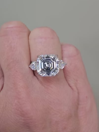 Asscher Cut Center with Pear Side Stones