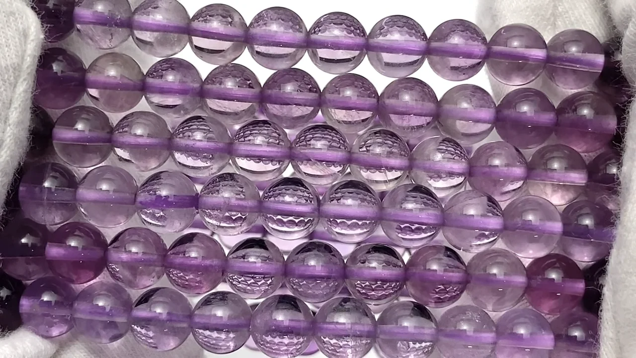 動画】パープルフローライトAAA ラウンド6mm 1連(ブレス) - 天然石