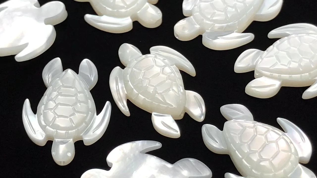 ホワイトシェル 亀シェイプ18×13mm 2粒｜天然石ビーズの卸問屋