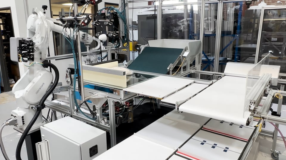 AI-powered robotic induction of polybagged apparel