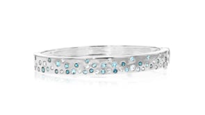 2.30 ct. t.w. Tonal Blue Topaz Bangle Bracelet in Sterling Silver