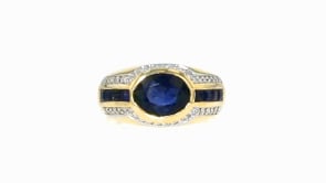 2.40 ct. t.w. Sapphire and .20 ct. t.w. Diamond Ring in 14kt Yellow Gold