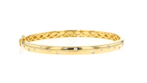 25 ct. t.w. Diamond Dotted Zigzag Bangle Bracelet in 18kt Gold Over Sterling