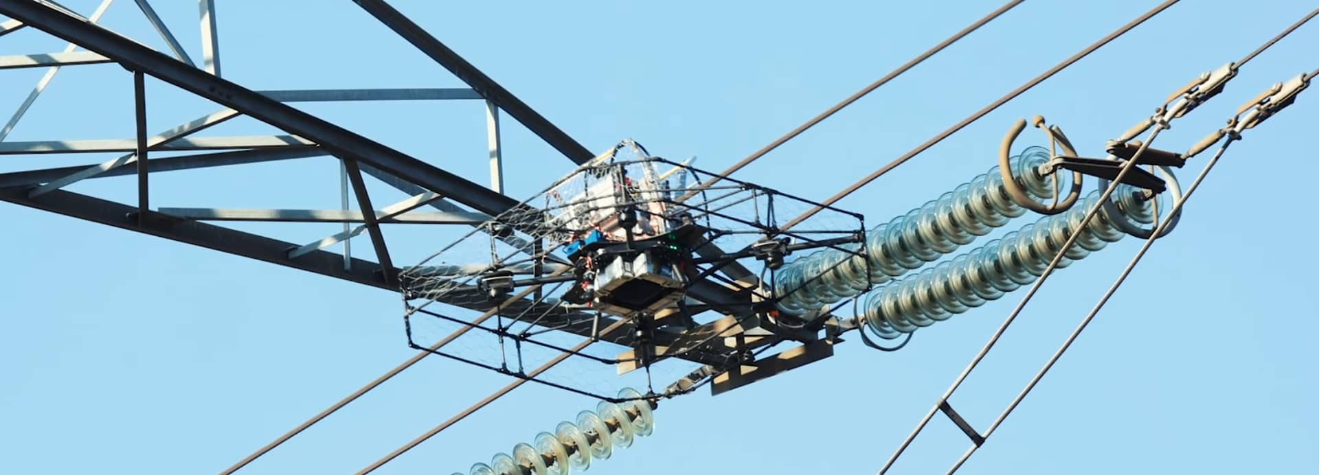 Ampacimon drone installation of a DLR sensor on a Live 220 kV line on Vimeo