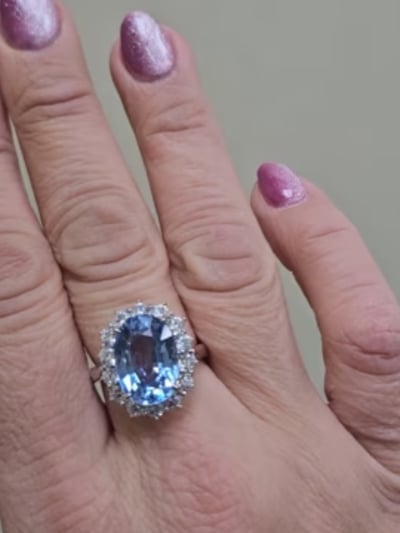 Oval Aqua Center Ring in a Halo Setting