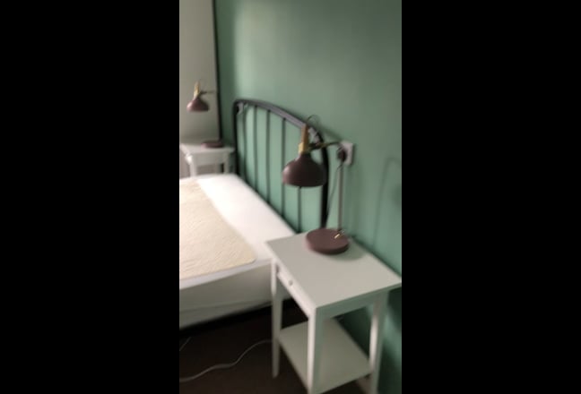 Room with young professional female  Main Photo