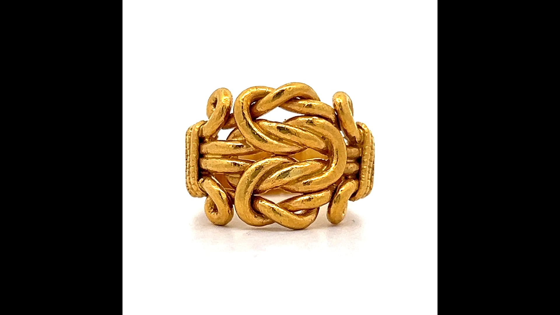 Lot - Tiffany & Co. 14K gold knot cufflinks. Marked 