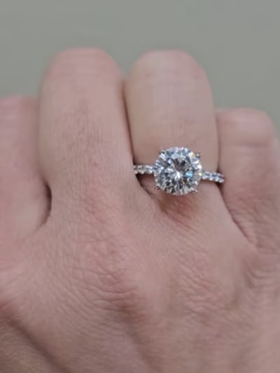 2.5CT CENTER WITH STONES ON SHANK AND BASKET