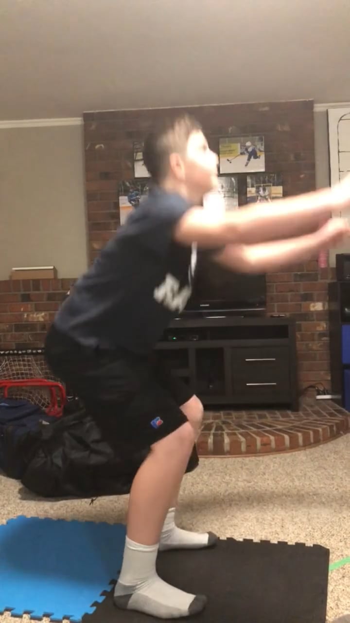 Watch lee jordan's Air Squats: 21 air squats