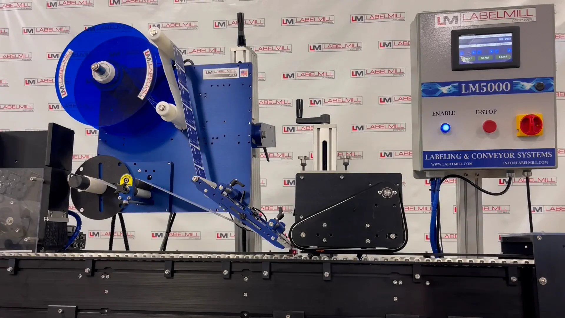 Automatic Tamp Label Applicator for Flat Products - LM4012TM
