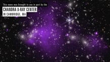 Freeze frame of video, showing a cluster of many glowing white galaxies, with two areas of hazy purple overlaid, one large at the center of the image, stretching from top to bottom, and a smaller purple area to the lower right. Text at upper right of the screen reads, This news was brought to you in part by the Chandra X-ray Center in Cambridge, MA.
