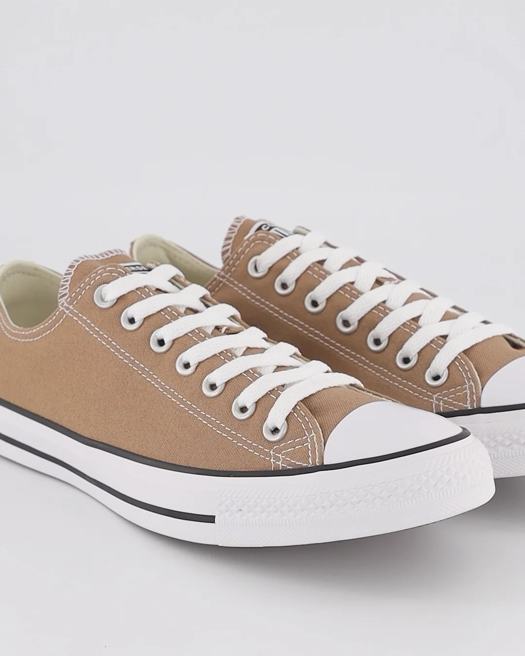 Shop Converse Chuck Taylor All Star Low Top in Brown