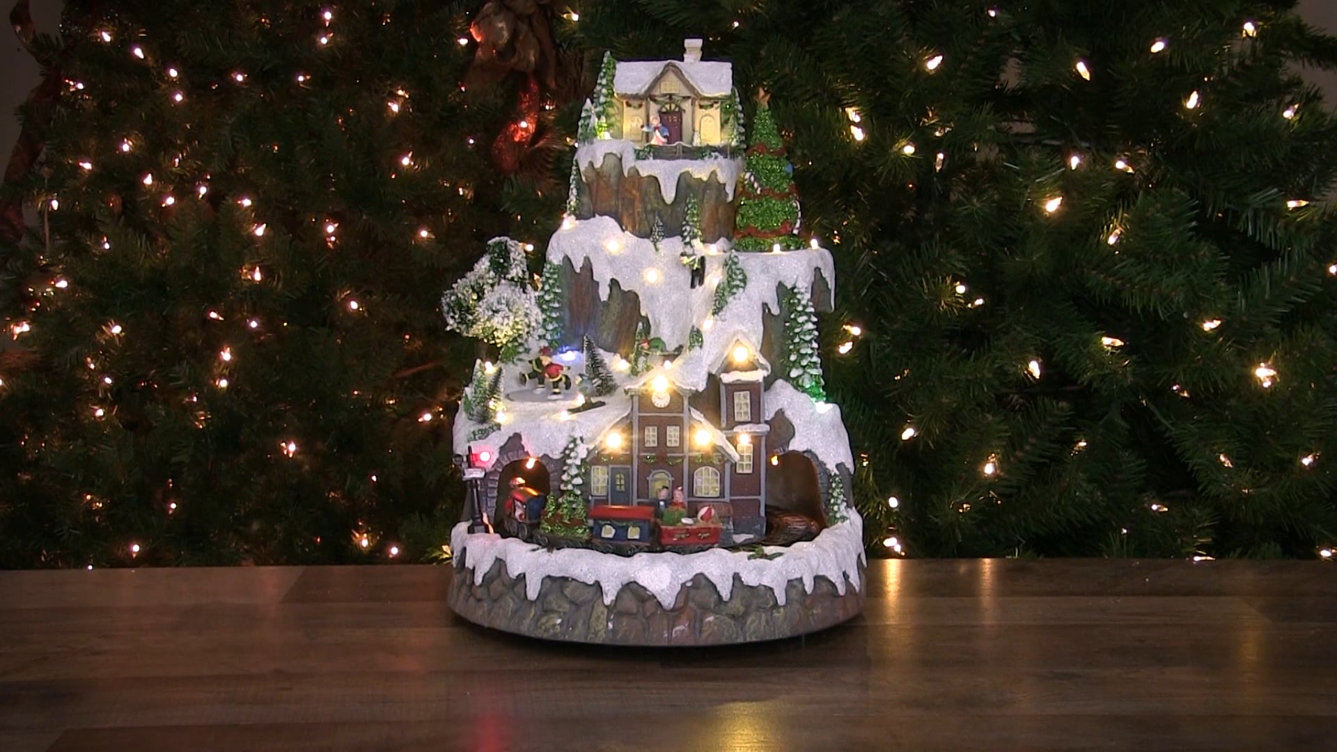 17" LED Lighted and Animated Christmas Village With Moving Train ...