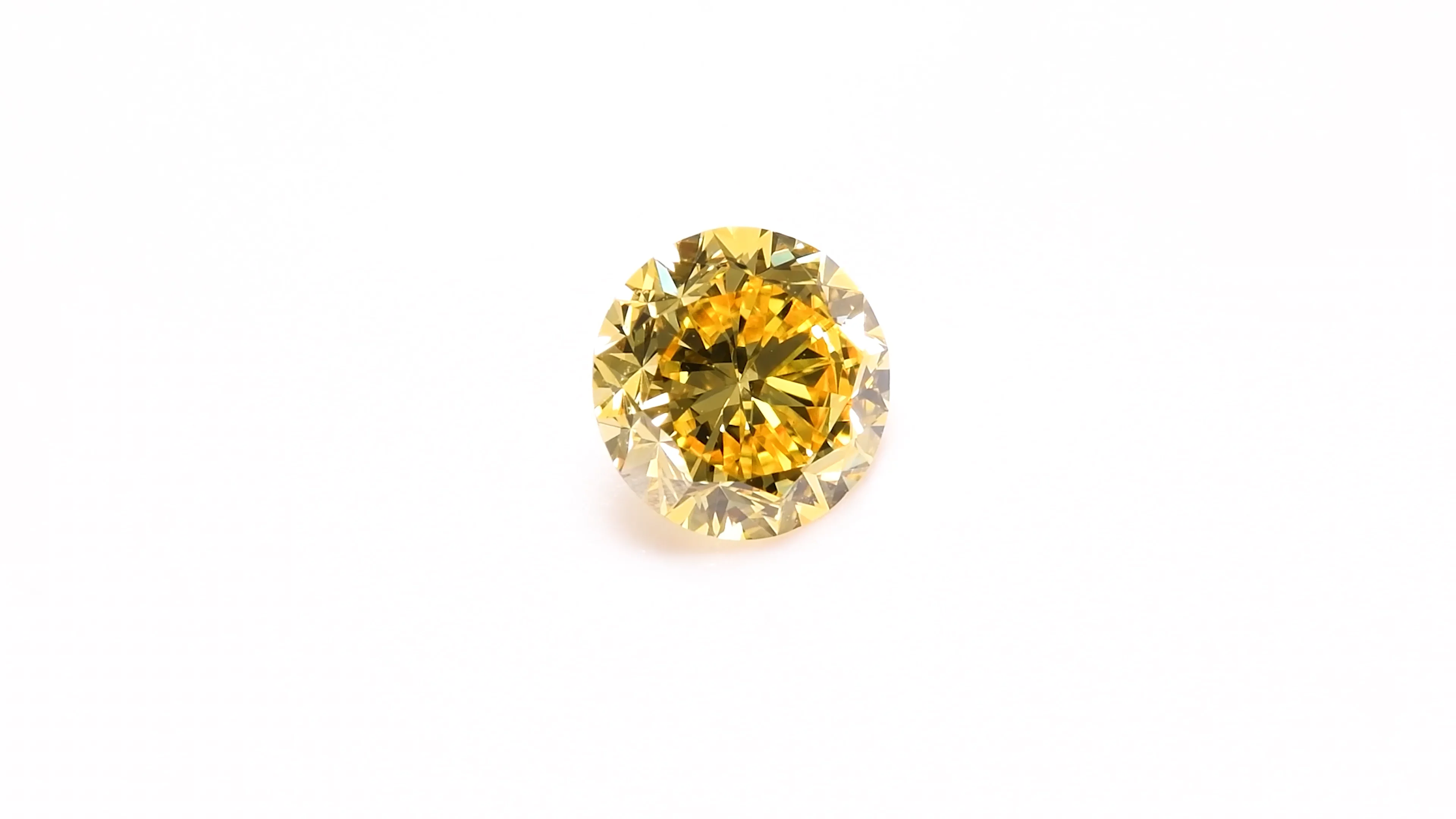 An Exceptional Unmounted Fancy Vivid Yellow Diamond