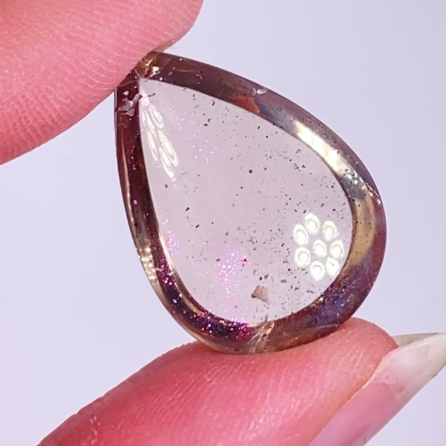 Quartz var: Smoky with Covellite inclusions (pink flash)