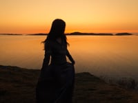 A dance in front of a March sunset