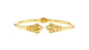 C. 1970 Vintage 18kt Yellow Gold Double Ram Head Cuff Bracelet with Pink Sapphire Accents
