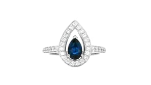 C. 1990 Vintage .64 Carat Sapphire and .40 ct. t.w. Diamond Ring in Platinum
