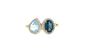 90 Carat London Blue and .70 Carat Sky Blue Topaz Toi et Moi Ring with .20 ct. t.w. White Topaz in 18kt Gold Over Sterling