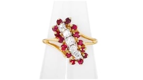 C. 1980 Vintage 1.15 ct. t.w. Ruby and .35 ct. t.w. Diamond Diagonal Ring in 14kt Yellow Gold