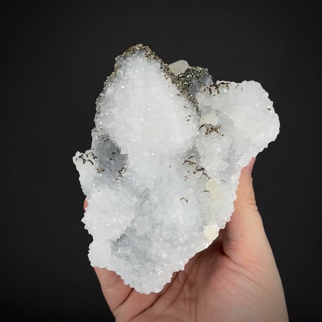 Iridescent Pyrite on Quartz ps. Calcite