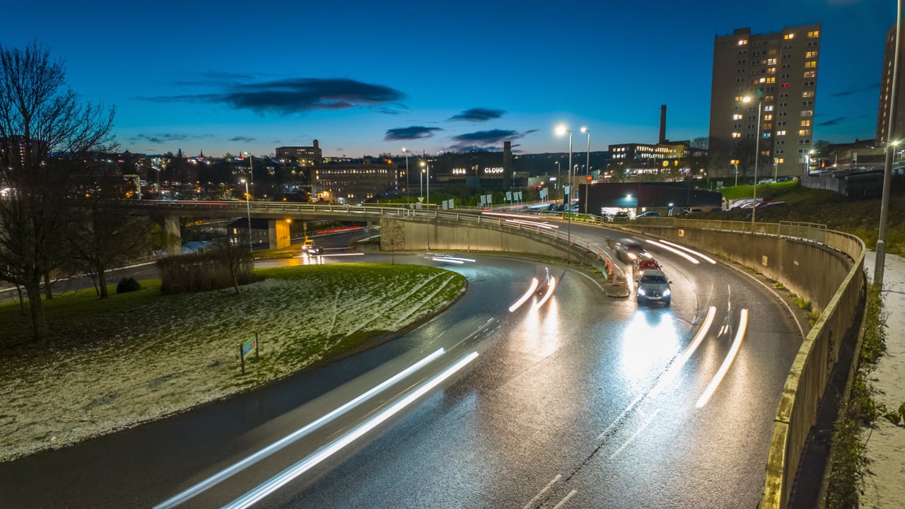 Light trails on busy roads aerial stock footage