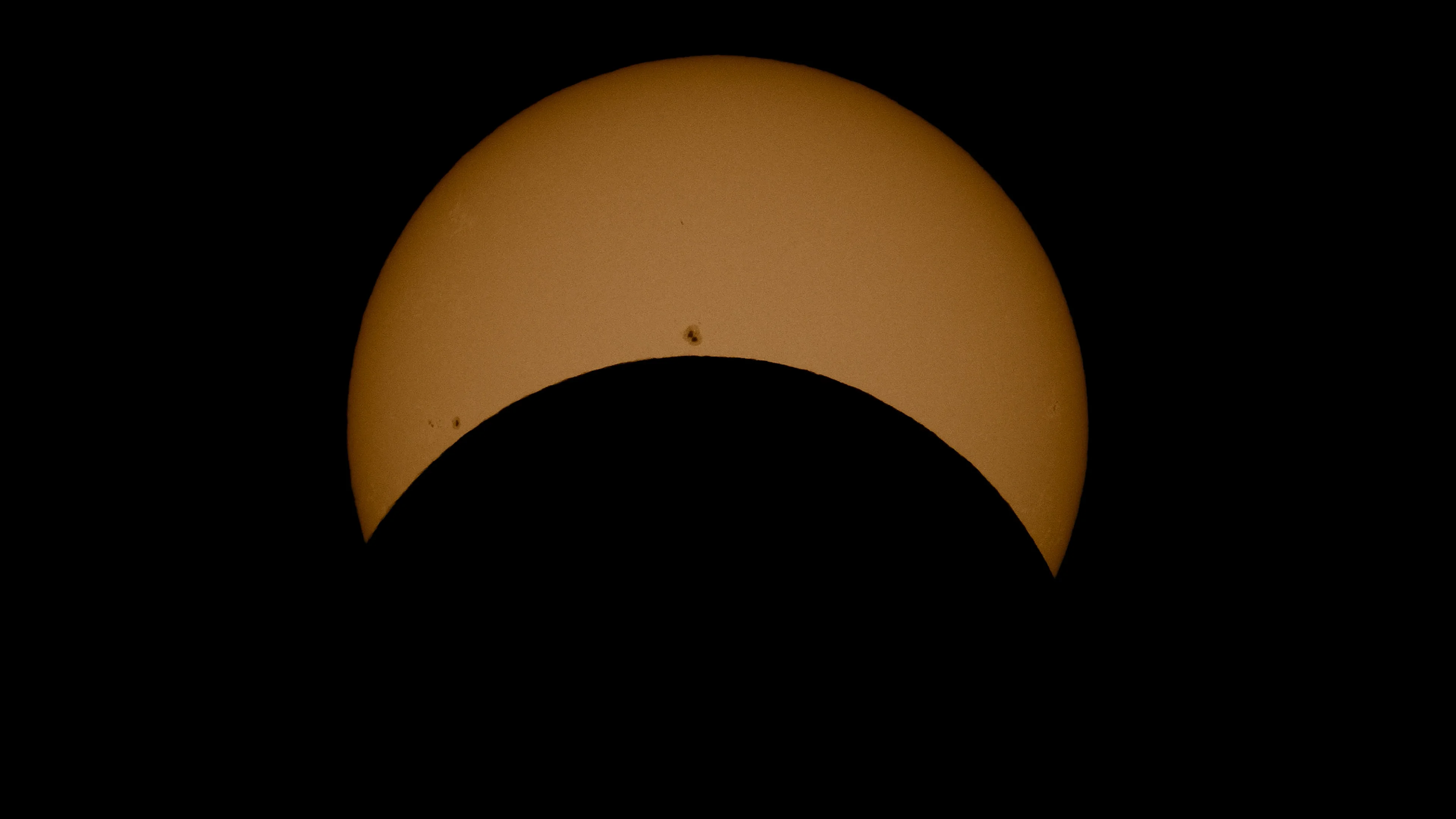 Partial Solar eclipse through the clouds on Vimeo