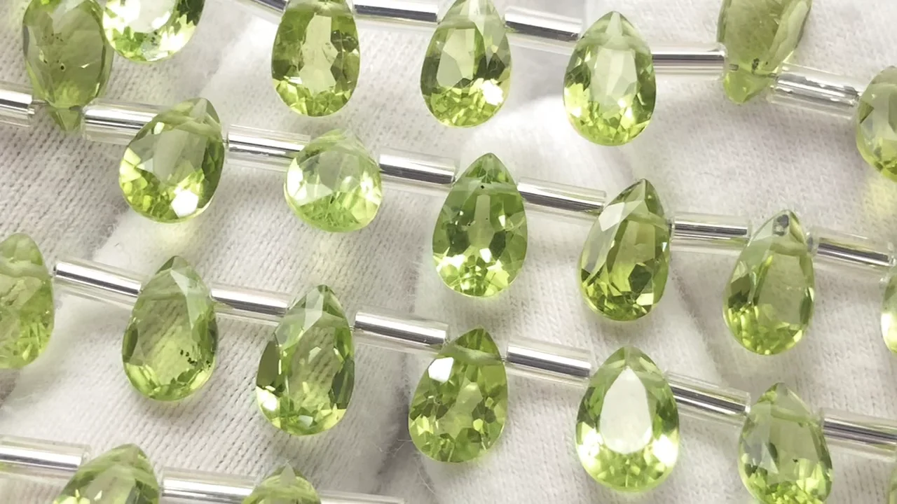 ペリドット ペアシェイプファセットカット8×5mm 半連/1連（18粒