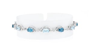 4.60 ct. t.w. London and Sky Blue Topaz Bracelet with .20 ct. t.w. Simulated White Sapphires in Sterling Silver