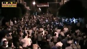 مظاهرة مسائية بمشاركة نسائية يغني فيها الساروت في حي البياضة في مدينة حمص