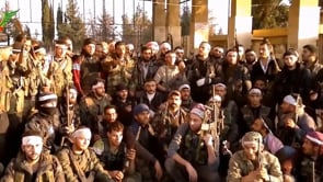 مجموعة من المقاتلين والقادة العسكريين في لواء التوحيد يعلنون في بيان السيطرة على المنطقة الحرة في محيط مدرسة المشاة في ريف حلب