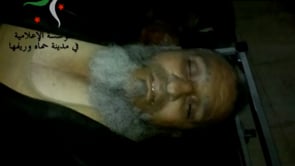 جثمان أبو طارق الشحود أحد عناصر لواء الإسلام قضى في معركة الثأر لشهداء مورك في ريف حماة