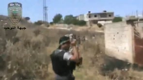 توجه عناصر جبهة التوحيد الى أحد الحواجز على جبهة الرستن ضمن معركة نصرة للقصير