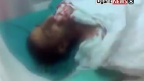 جثمان هادي الجندي الذي قتل على يد الامن في مدينة حمص في محافظة حمص