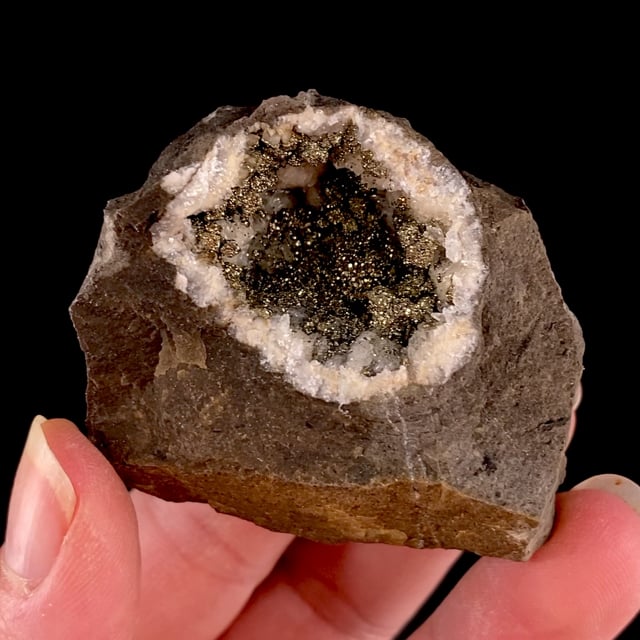 Pyrite on Calcite