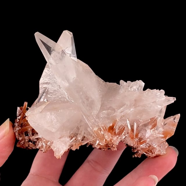 Calcite (twins) with iron oxide inclusions)