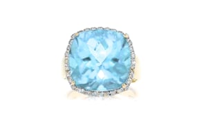 18.00 Carat Sky Blue Topaz and .17 ct. t.w. Diamond Frame Ring in 14kt Yellow Gold