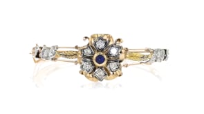 C. 1950 Vintage .35 Carat Sapphire and 1.50 ct. t.w. Diamond Bangle Bracelet in 14kt Two-Tone Gold