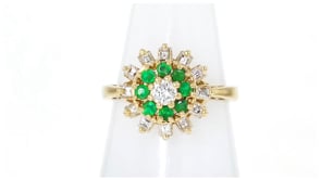 C. 1980 Vintage .75 ct. t.w. Diamond and .40 ct. t.w. Emerald Cluster Ring in 14kt Yellow Gold